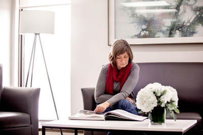 patient sitting in the waiting room at Dentistry by the Bay in Barrie, ON